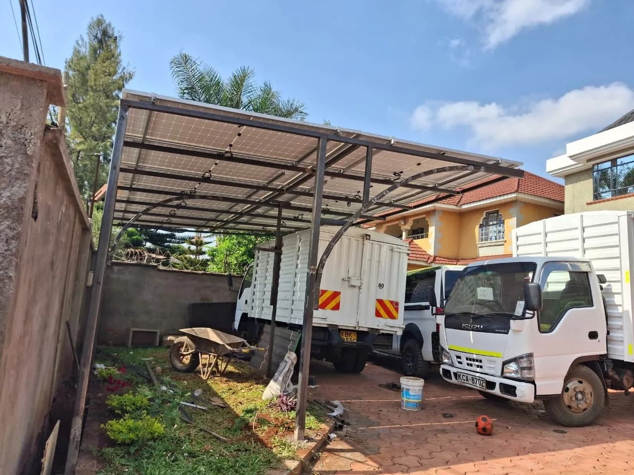RURERA Solar team constructing a solar carport structure